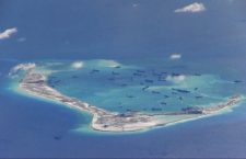 Chinese dredging vessels are purportedly seen in the waters around Mischief Reef in the disputed Spratly Islands in the South China Sea, May 21, 2015. 

REUTERS/U.S. Navy