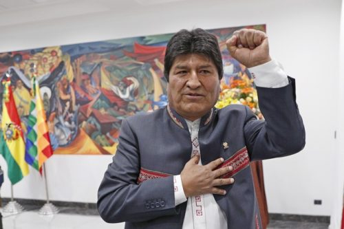 Bolivia's President Evo Morales leaves after a press conference in La Paz, Bolivia, Thursday, Oct. 24, 2019. Morales declared himself the winner of the country's presidential election, saying he received the 10 percentage point lead over his nearest rival needed to win in the first round of voting. (AP Photo/Juan Karita)