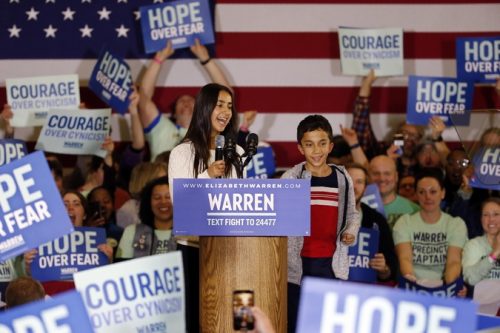 Lavinia and Atticus Tyagi introduce their grandmother, Democratic presidential candidate Sen. Elizabeth Warren, D-Mass., at a caucus night campaign rally, Monday, Feb. 3, 2020, in Des Moines, Iowa. (AP Photo/Sue Ogrocki)