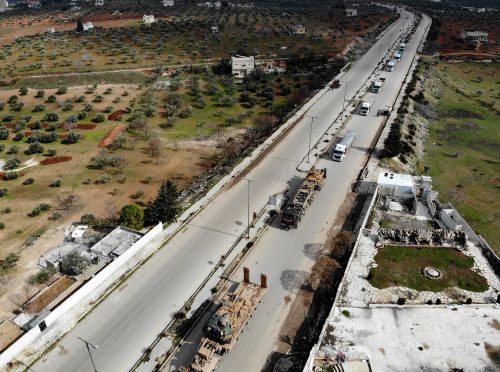 An aerial view taken on February 22, 2020 shows a Turkish military convoy that crossed into the Syrian territory via the Kafr Lusin border, passing near Syria's northwestern city of Idlib and heading toward the south of the Idlib province. (Photo by Omar HAJ KADOUR / AFP) (Photo by OMAR HAJ KADOUR/AFP via Getty Images)